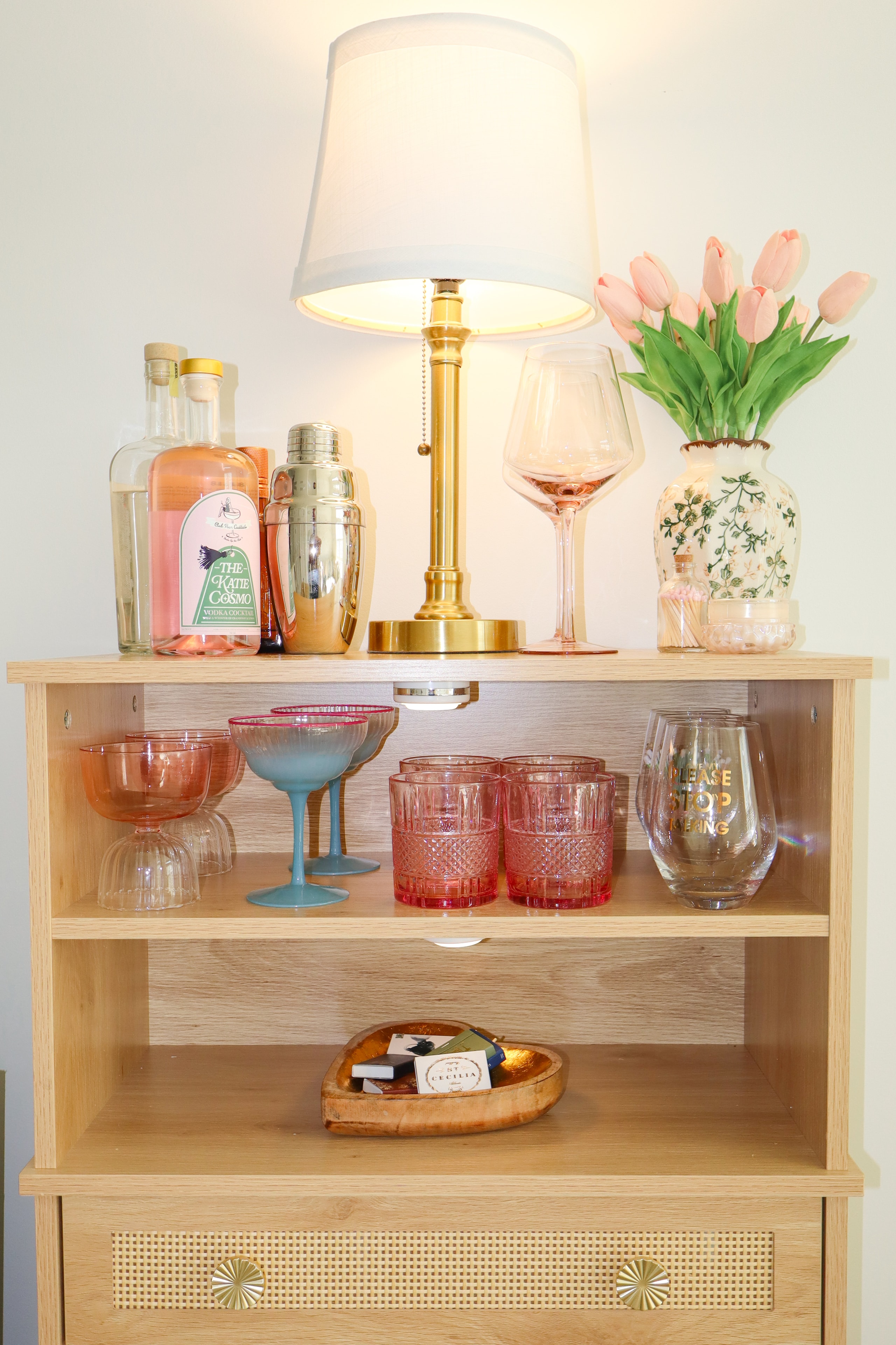 Styled bar cabinet with cocktail glassware